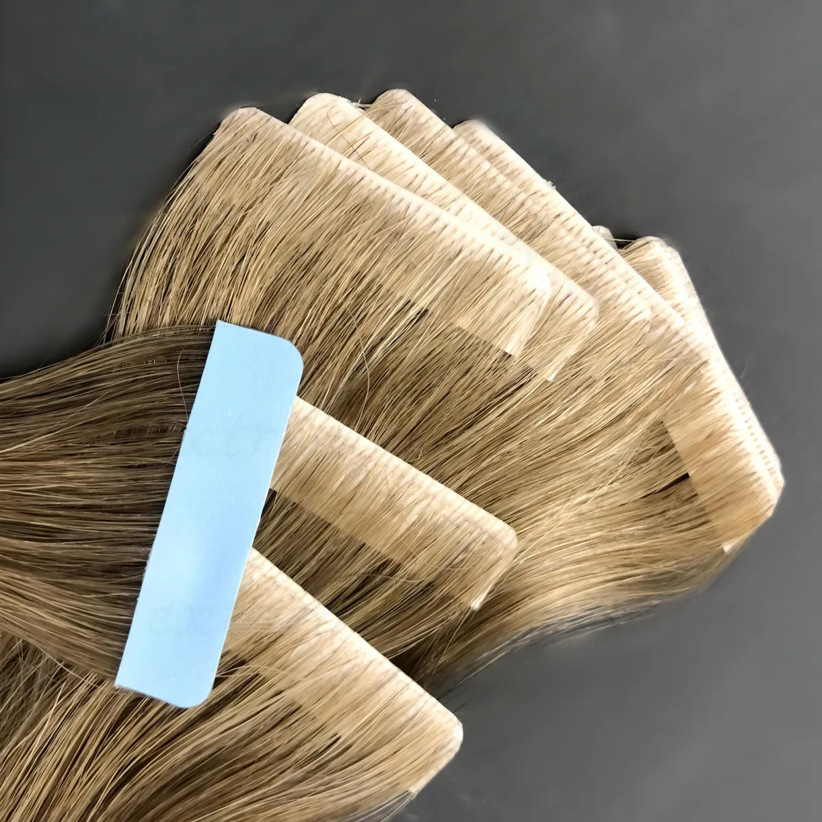 Extensions de ruban adhésif invisibles 45 cm, 10 pièces. - Blond moyen froid